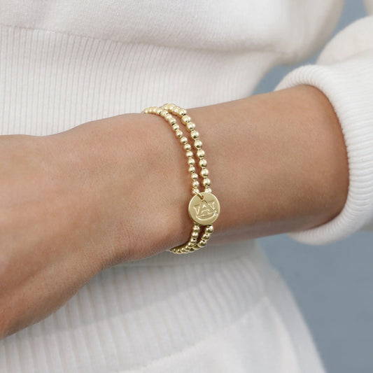 ecollegiate classic gold 3mm bracelet - auburn disc