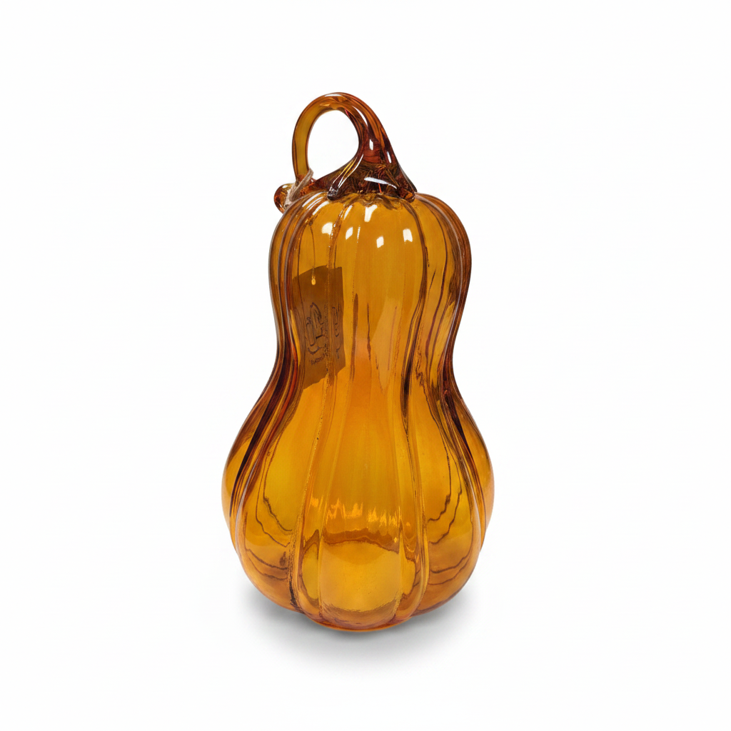 Orange glass gourd on a white background